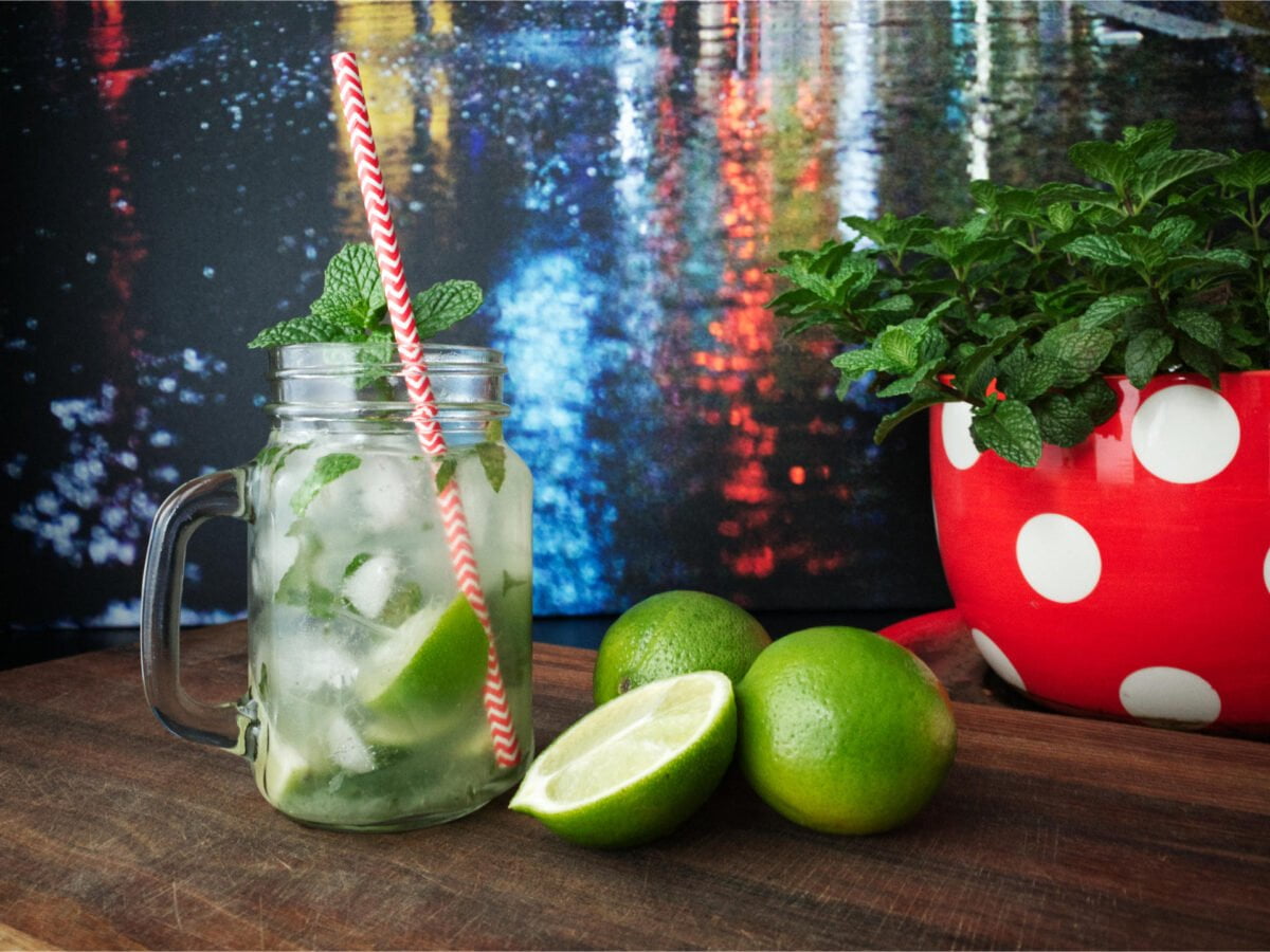 Mojito cocktail with limes and fresh mint