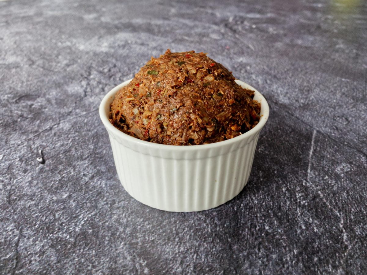 Massaman curry paste in a white ramekin