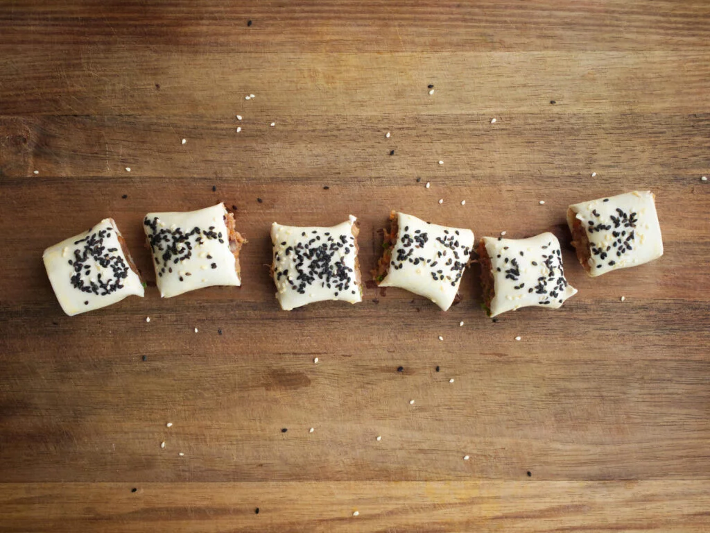 Beef sausage rolls ready for baking