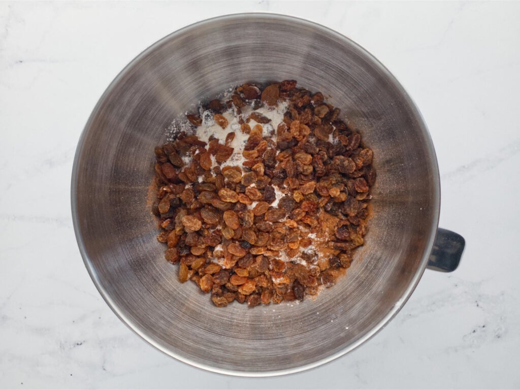 Large mixing bowl filled with dry ingredients