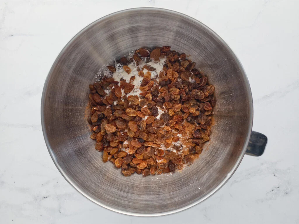 Large mixing bowl filled with dry ingredients