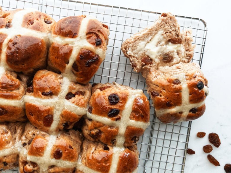 Delicious hot cross buns with lashings of butter