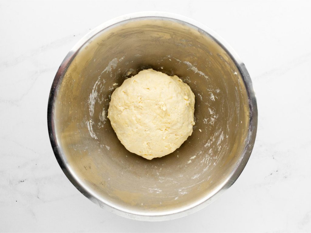 Ball of flatbread dough in a mixing bowl